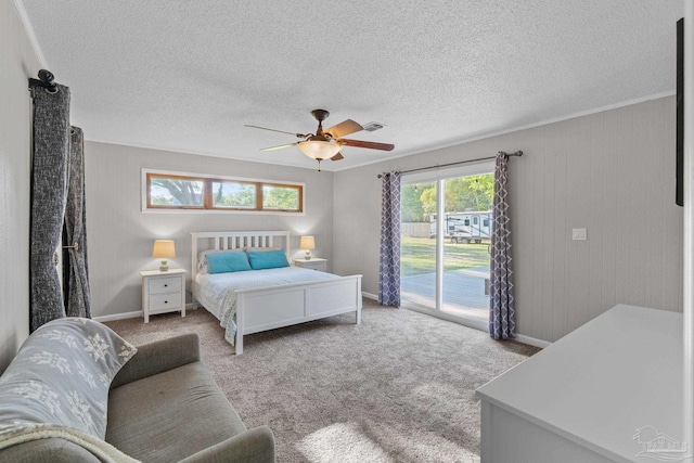 bedroom featuring access to outside, baseboards, visible vents, ceiling fan, and carpet