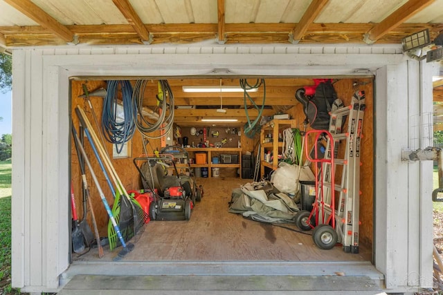 garage featuring a workshop area