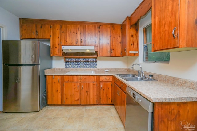 kitchen featuring stainless steel appliances and sink