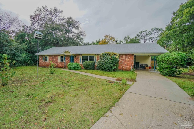 ranch-style house featuring a front yard and a carport