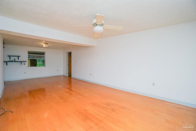 spare room featuring ceiling fan and wood-type flooring