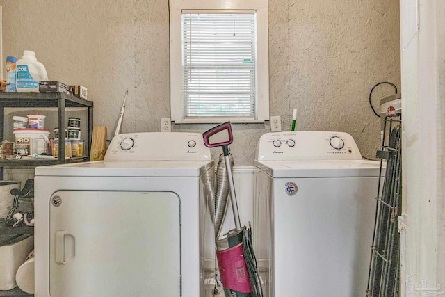 laundry area with separate washer and dryer