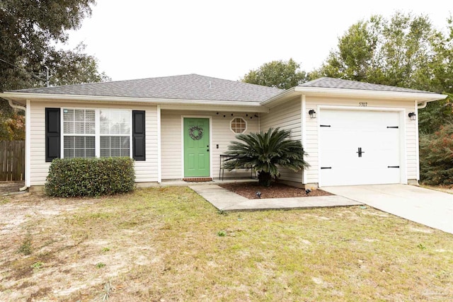 single story home with a front lawn and a garage