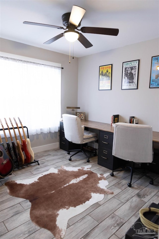 office area with ceiling fan