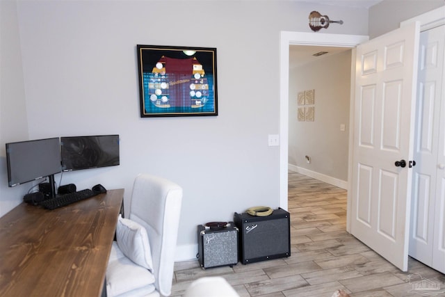 office area featuring light hardwood / wood-style floors