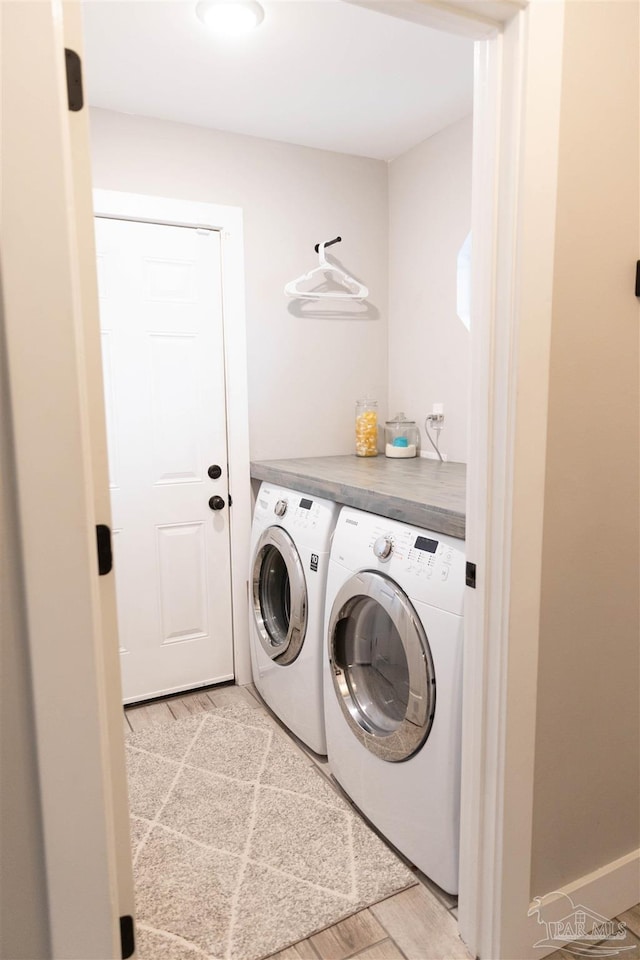 laundry room with washer and dryer