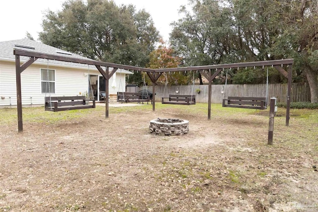 view of yard featuring a fire pit