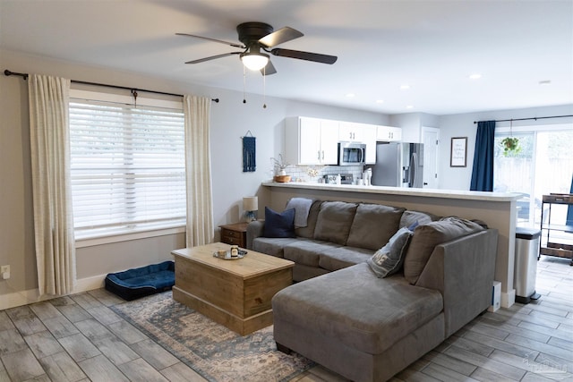 living room with ceiling fan