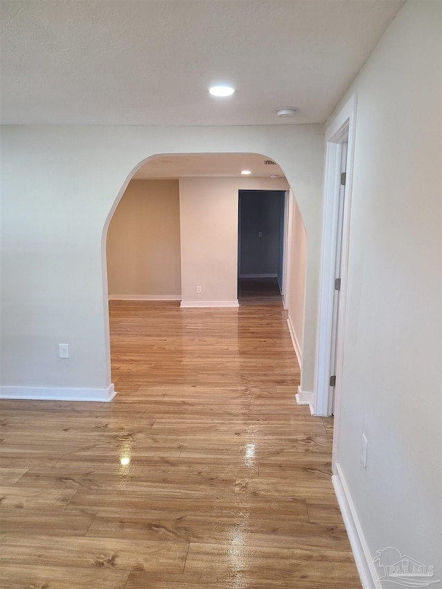 corridor featuring light wood-type flooring