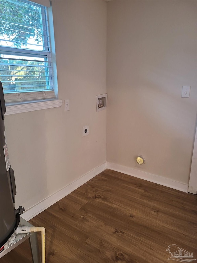 laundry area featuring dark wood-type flooring, hookup for an electric dryer, and hookup for a washing machine