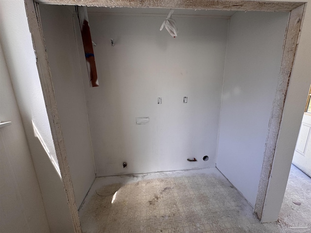 laundry area with light floors