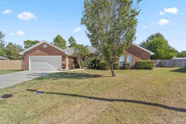 ranch-style house featuring a garage and a front lawn