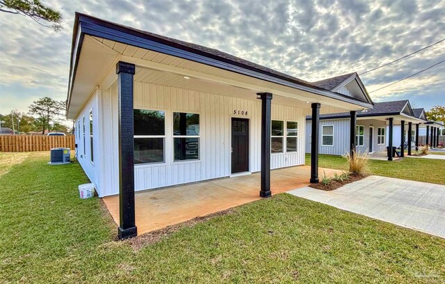 rear view of house featuring a patio