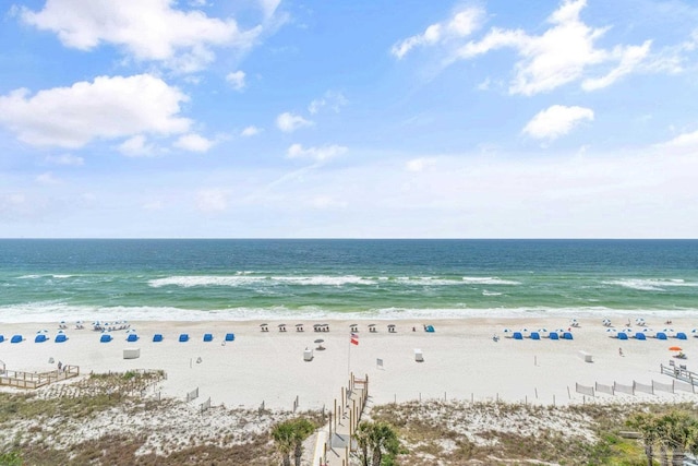 view of water feature with a beach view