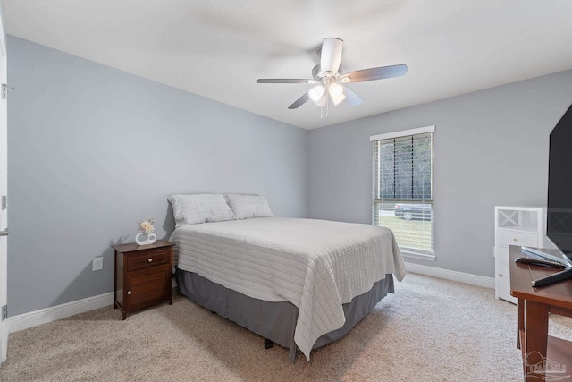 3246 Main St, Navarre, FL 32566 - bedroom featuring light carpet, ceiling fan, and baseboards