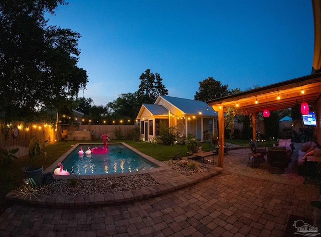 view of pool with a patio, a fenced backyard, and a fenced in pool