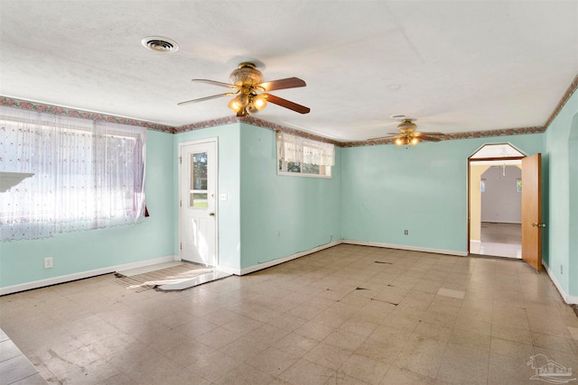 spare room featuring ceiling fan