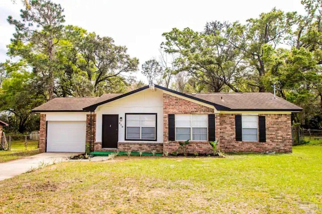 ranch-style home featuring a garage and a front yard