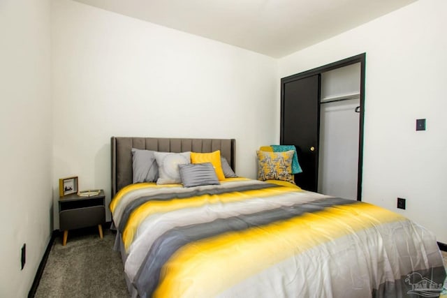 carpeted bedroom featuring a closet