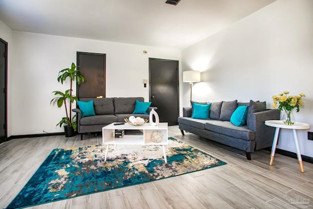 living room with light hardwood / wood-style floors