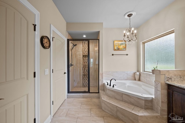 full bath with vanity, a bath, a stall shower, and a notable chandelier