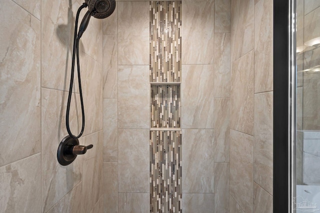 details with a tile shower