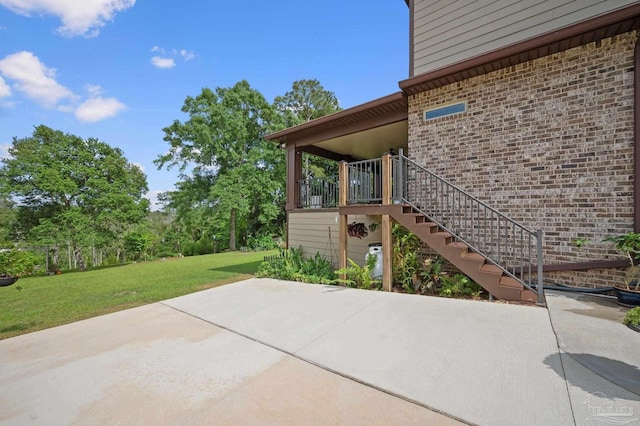 view of patio with stairway