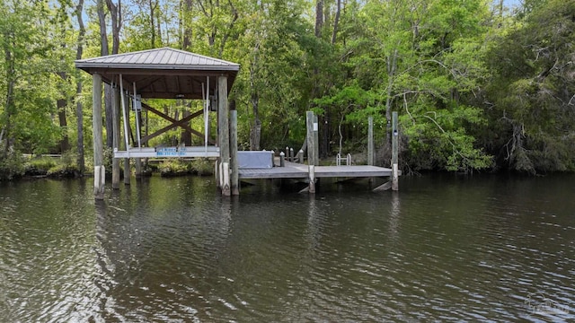 view of dock with a water view