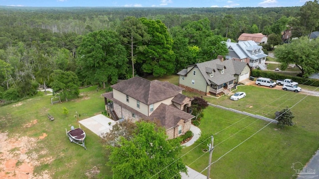 bird's eye view featuring a view of trees