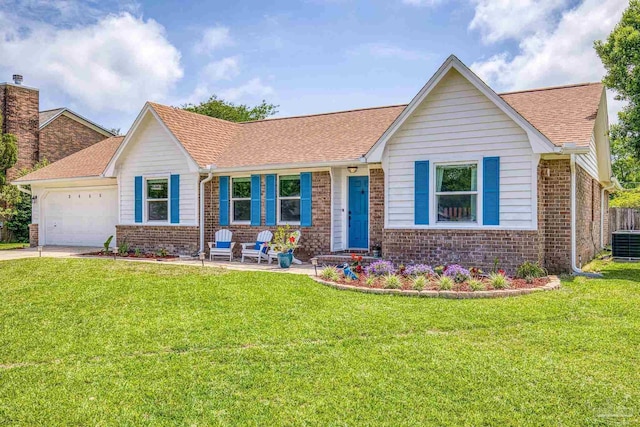 single story home with brick siding, driveway, cooling unit, a front yard, and an attached garage