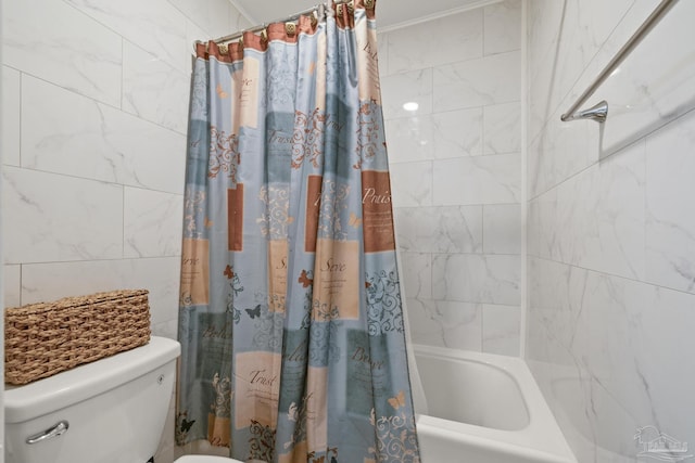 bathroom with shower / bath combo and toilet