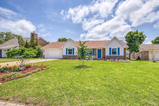 single story home with driveway, a front yard, an attached garage, and brick siding