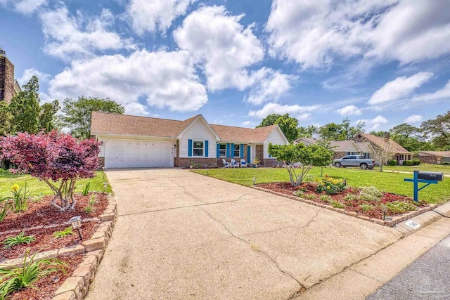ranch-style house with a front lawn, a garage, concrete driveway, and brick siding