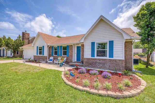 ranch-style house with a front yard, central AC, an attached garage, and brick siding