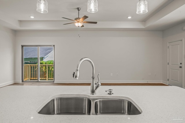 520 K St, Pensacola, FL 32501 - kitchen featuring a sink, a tray ceiling, ceiling fan, pendant lighting, and recessed lighting