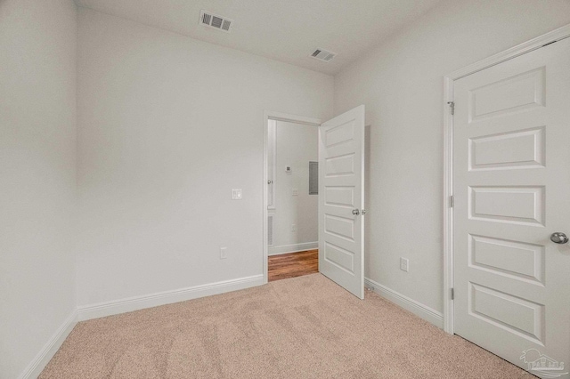 520 K St, Pensacola, FL 32501 - unfurnished bedroom featuring carpet floors and baseboards