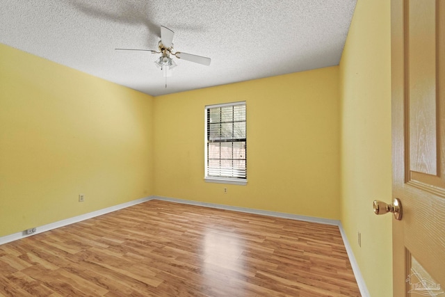 unfurnished room featuring a textured ceiling, light hardwood / wood-style floors, and ceiling fan