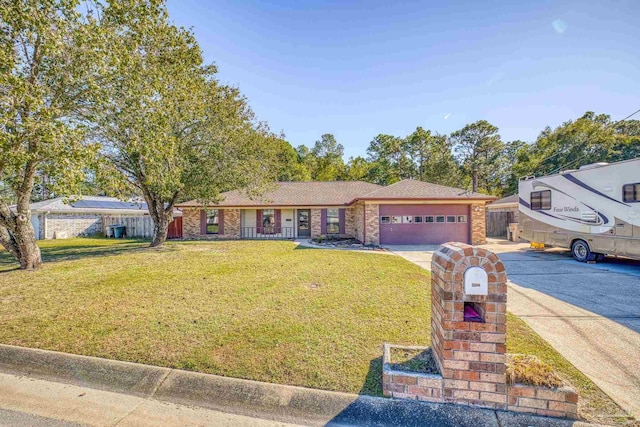 view of front of house with a front lawn and a garage