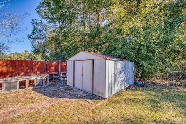 view of outdoor structure featuring a yard