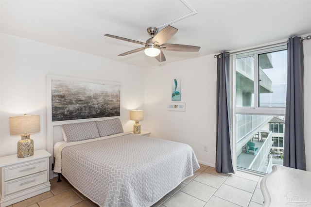 tiled bedroom with ceiling fan