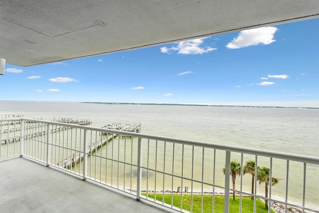 balcony featuring a water view