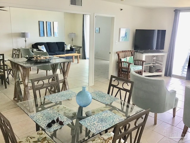 view of tiled dining space