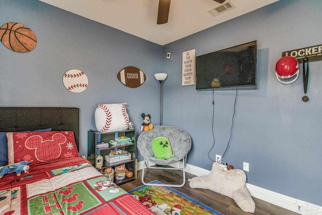 bedroom featuring wood-type flooring and ceiling fan