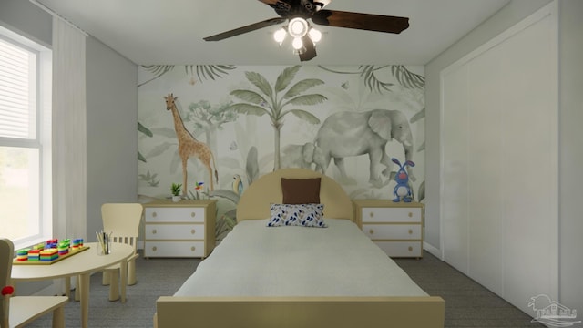 carpeted bedroom featuring ceiling fan