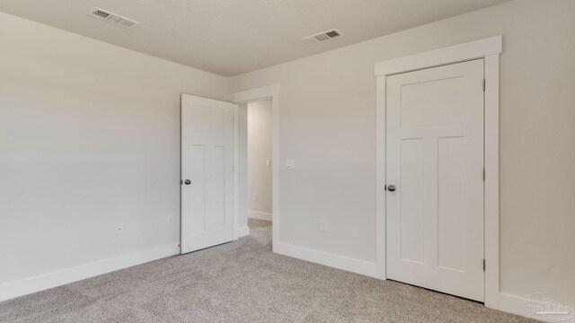 2733 Chevy Cir, Pace, FL 32571 - unfurnished bedroom with carpet floors and baseboards