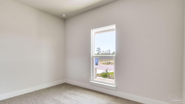 2733 Chevy Cir, Pace, FL 32571 - unfurnished room with light carpet, baseboards, and a smoke detector