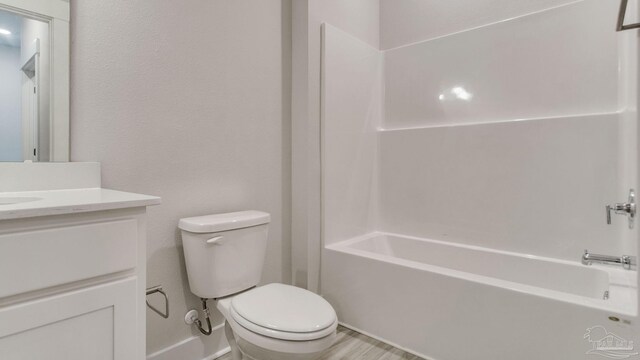2733 Chevy Cir, Pace, FL 32571 - bathroom with toilet, vanity, and shower / washtub combination
