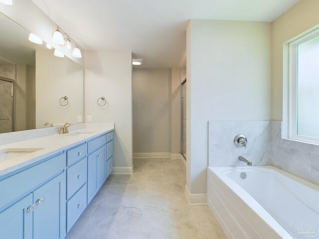 bathroom with dual vanity, separate shower and tub, and tile patterned flooring