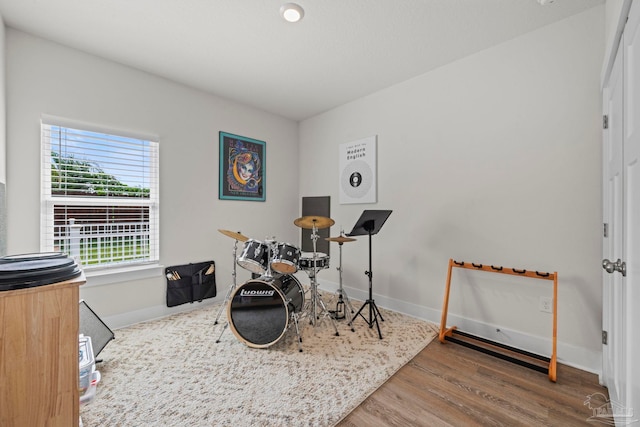3416 Southwind Dr, Gulf Breeze, FL 32563 - game room with wood finished floors and baseboards