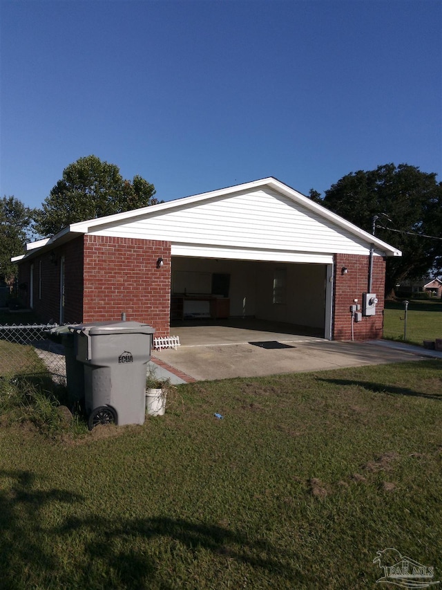 view of home's exterior with a lawn